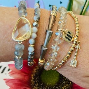 Bomb party five stack bracelets grey & gold. Arrow